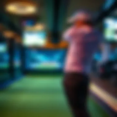 Golfer in Action at Topgolf A close-up of a golfer taking a swing at Topgolf's state-of-the-art driving range