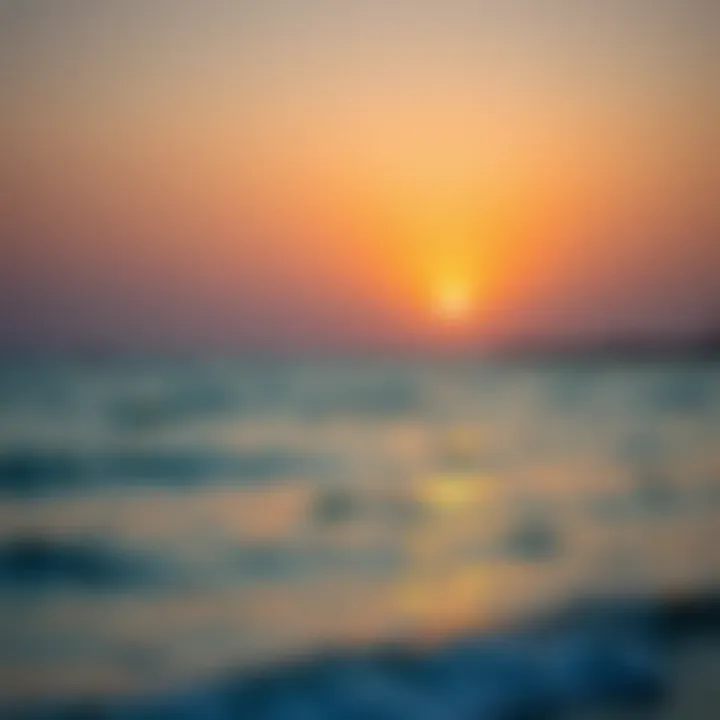 A serene sunset over the tranquil waters of Hudariyat Beach
